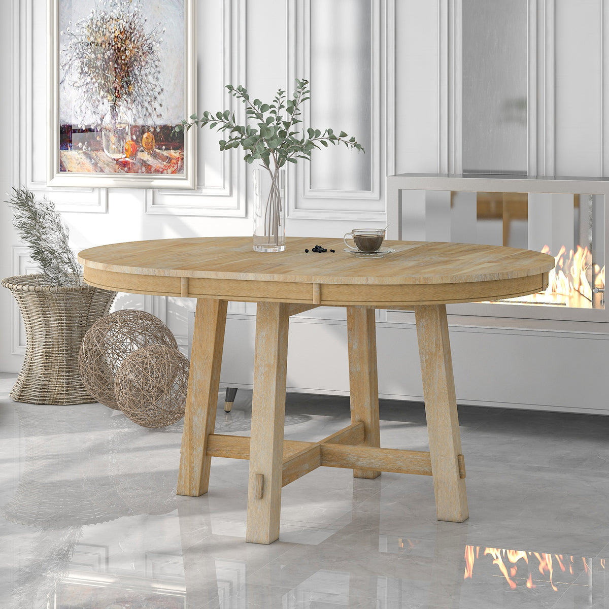 Styled room with oak round dining table, eucalyptus stems and coffee near a fireplace