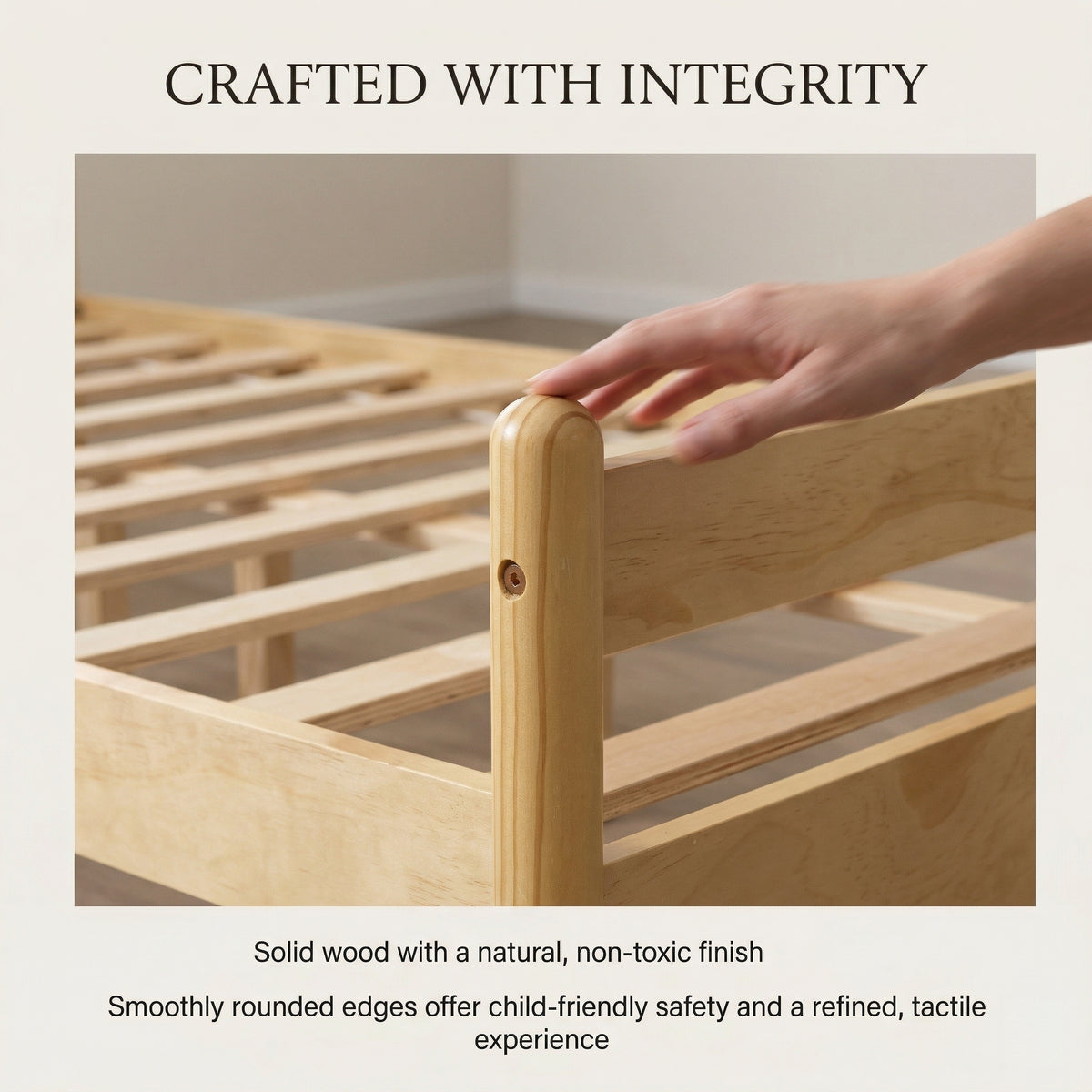Hand resting on a rounded natural pine corner post above the slat frame