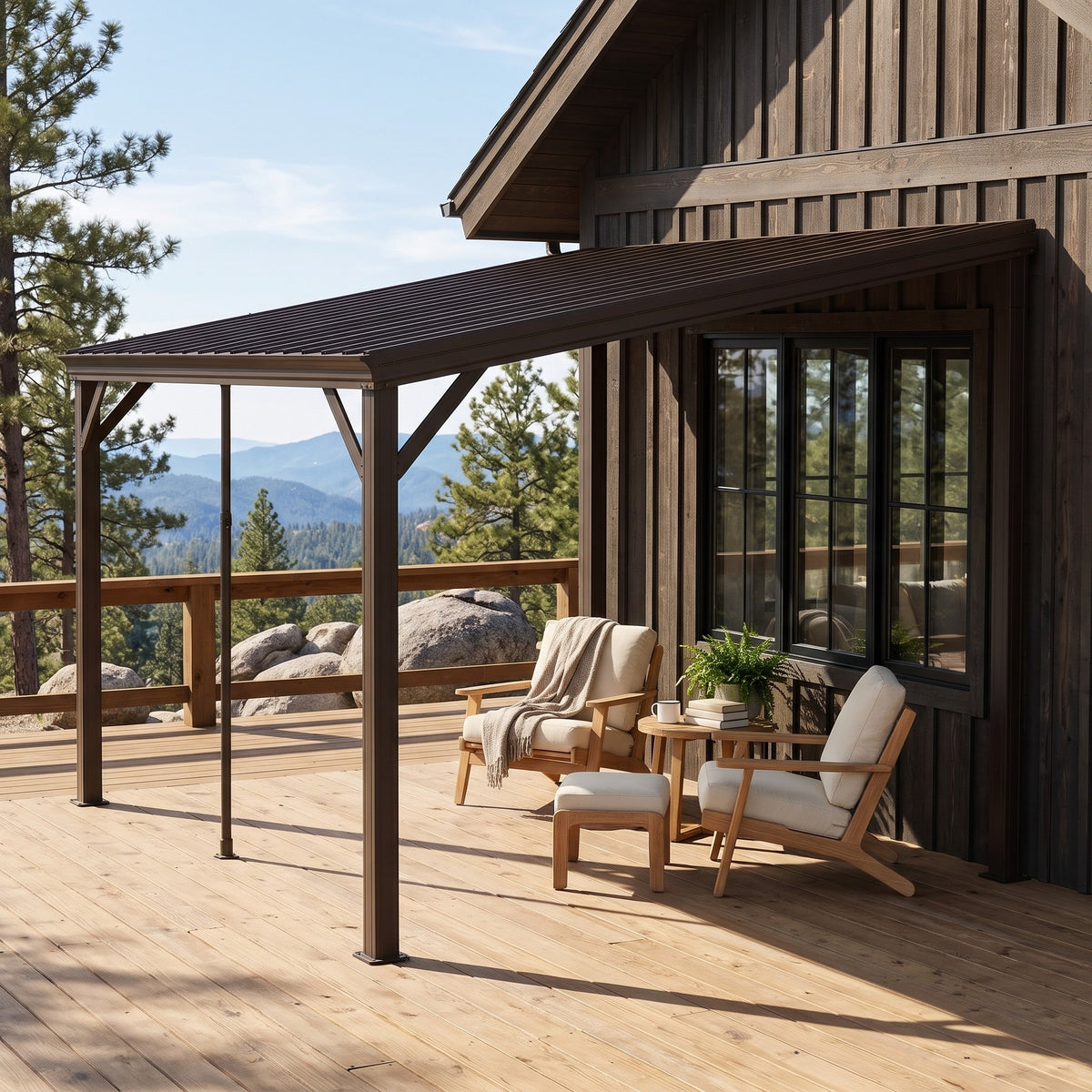 Brown metal 10x12 lean-to hardtop gazebo on a wood deck against a cabin wall with lounge chairs and mountain views