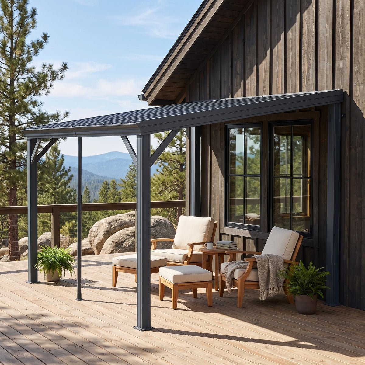 Gray metal lean-to hardtop gazebo against a dark wood house over two lounge chairs on a sunny deck