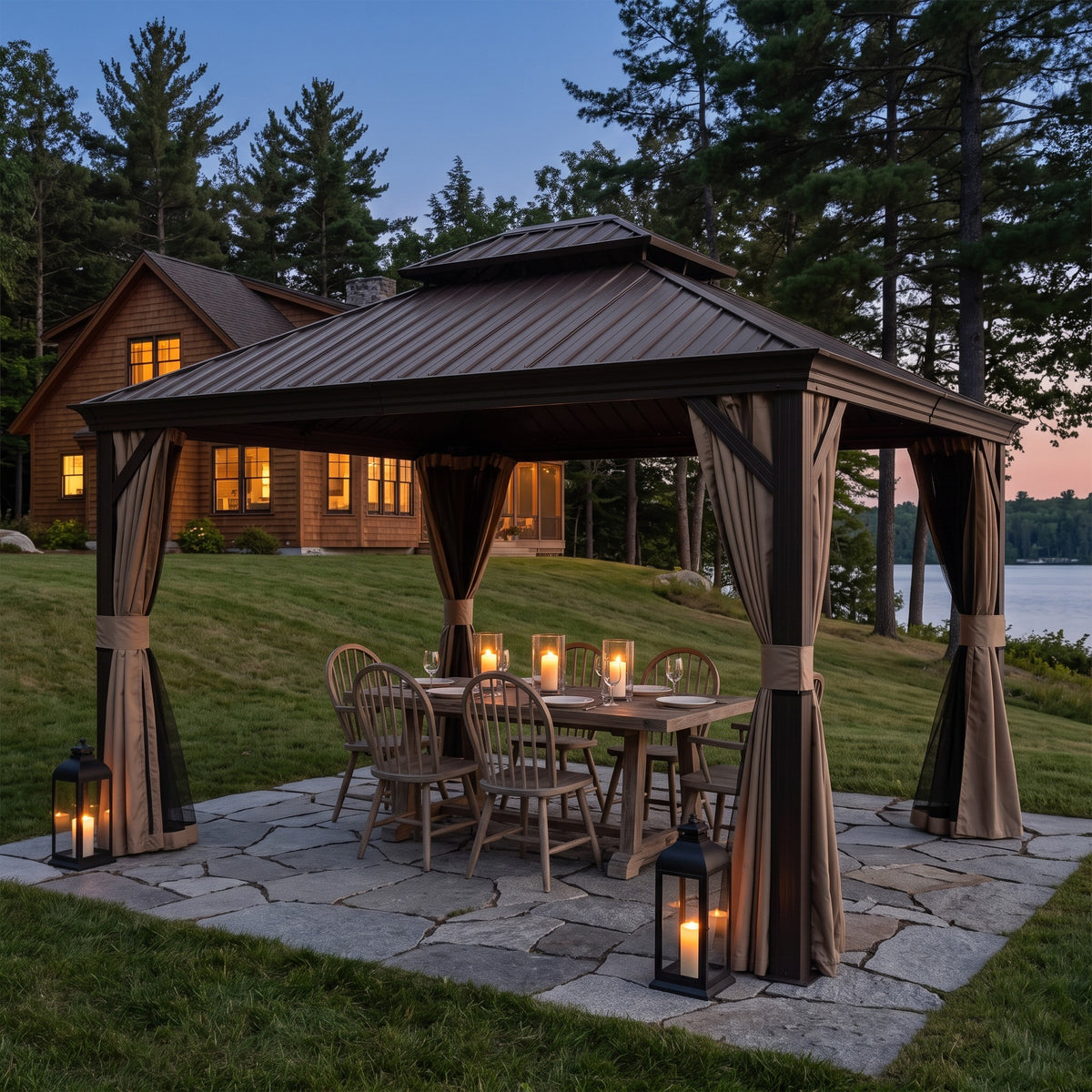 Brown metal double roof hardtop gazebo with tan curtains over a candlelit dining table on a stone patio at dusk