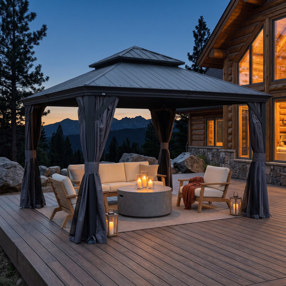 Dark gray 12x12 hardtop gazebo with tied back curtains over a sofa and chairs on a cabin deck at dusk