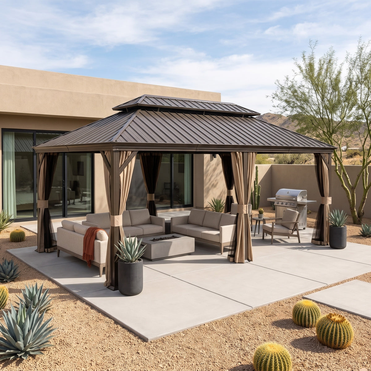 Brown steel 12x24 double roof hardtop gazebo with tan curtains over sofas and a fire table on a desert patio