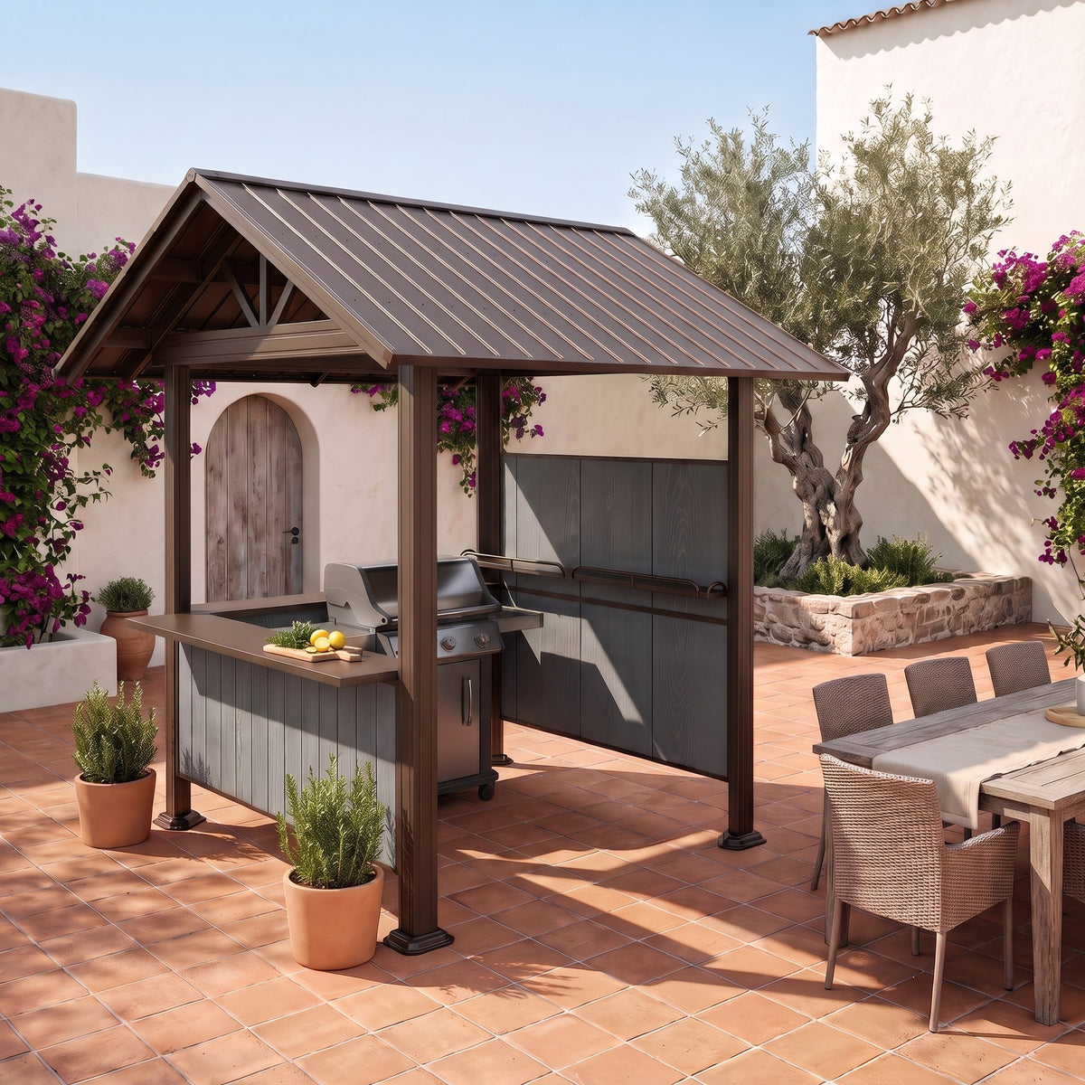 Brown steel gable roof grill gazebo with gray side panels and shelves over a grill on a terracotta patio in daylight