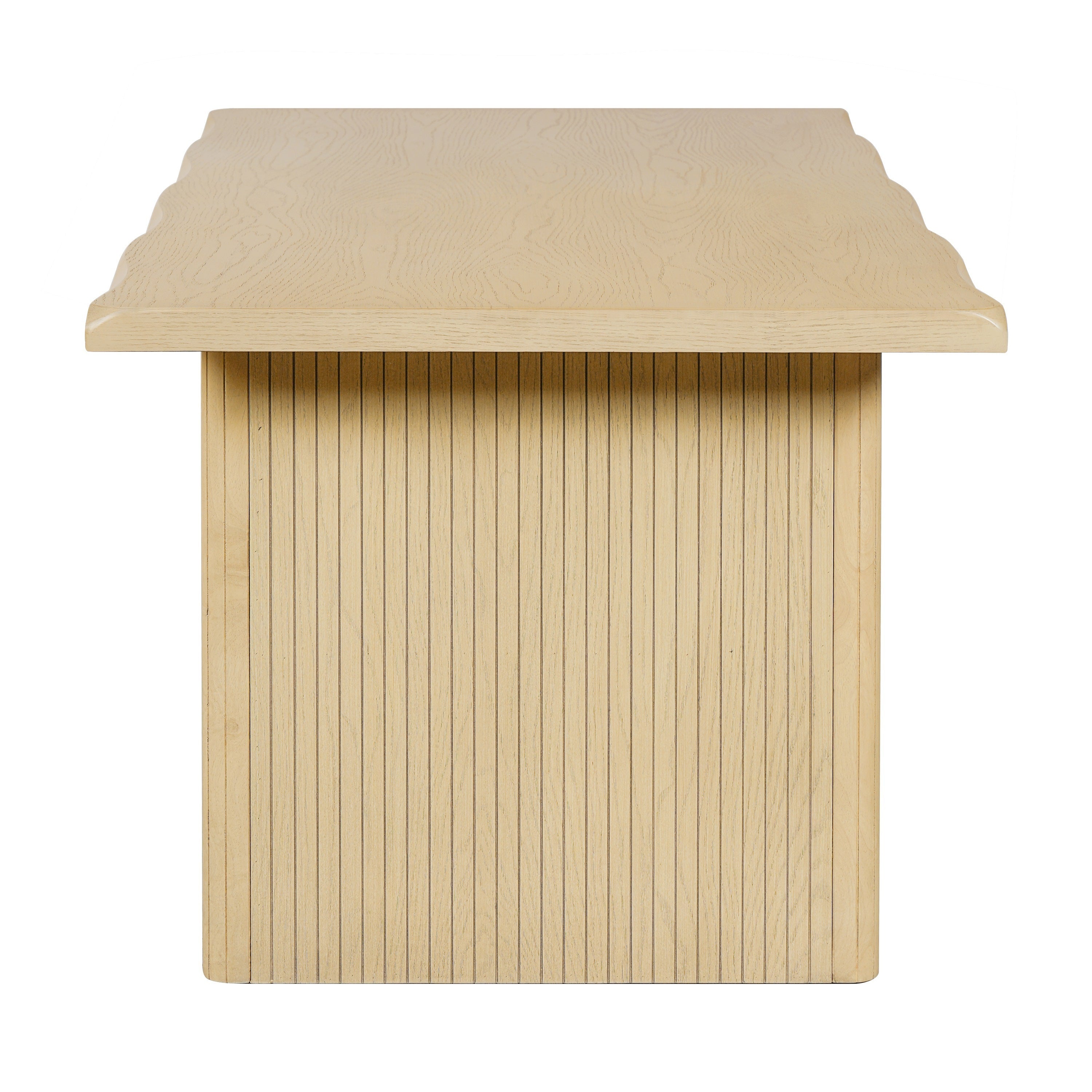 Side profile of the natural oak dining table showing the fluted panel leg