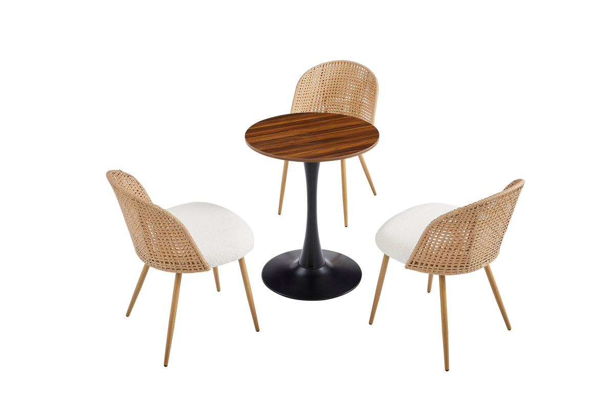 Studio shot of dark wood-grain round bistro table with three woven rattan chairs