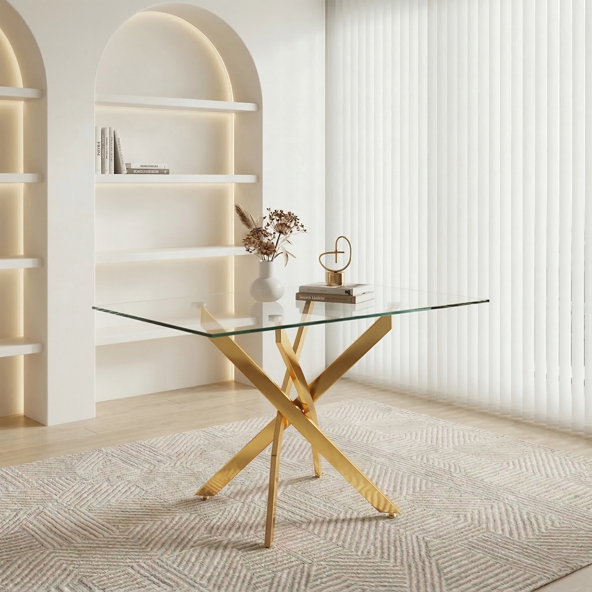 Styled room scene with the glass dining table and gold legs holding a vase and books