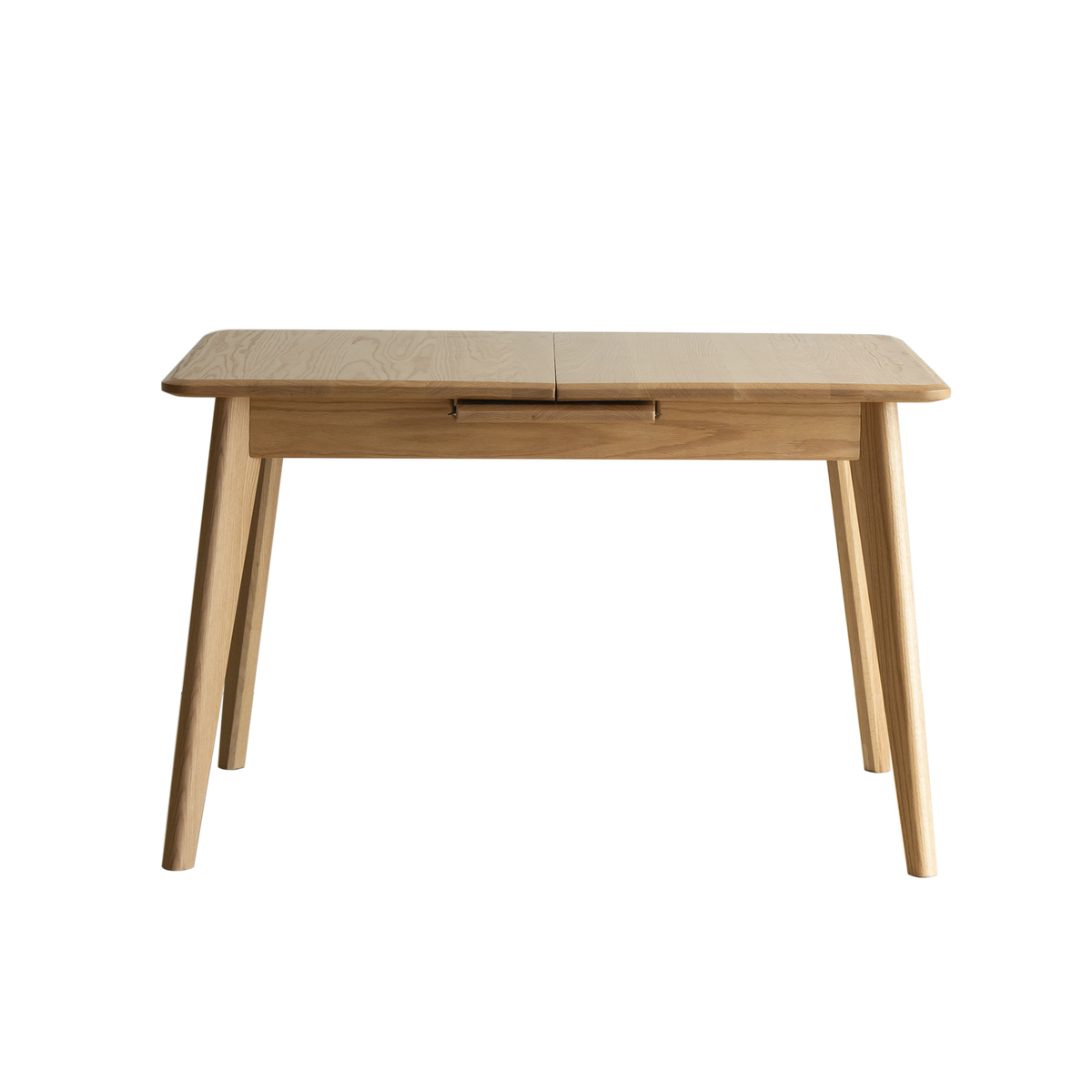 Front view of the natural oak extendable dining table on a white background