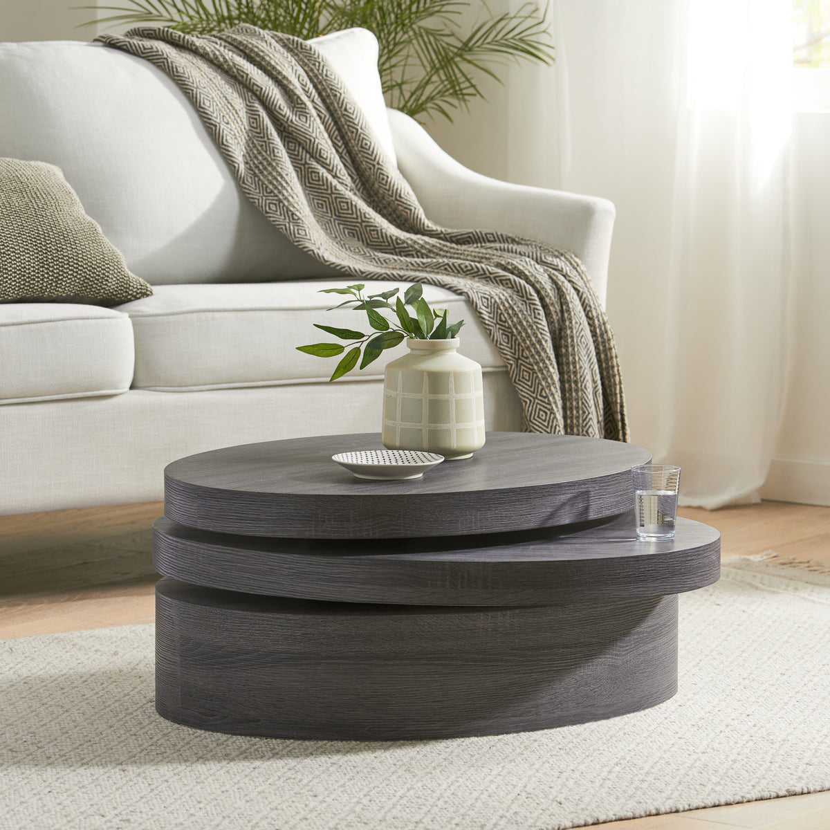 Gray Wood-Grain Oval Swivel-Top Coffee Table, 23.5 in