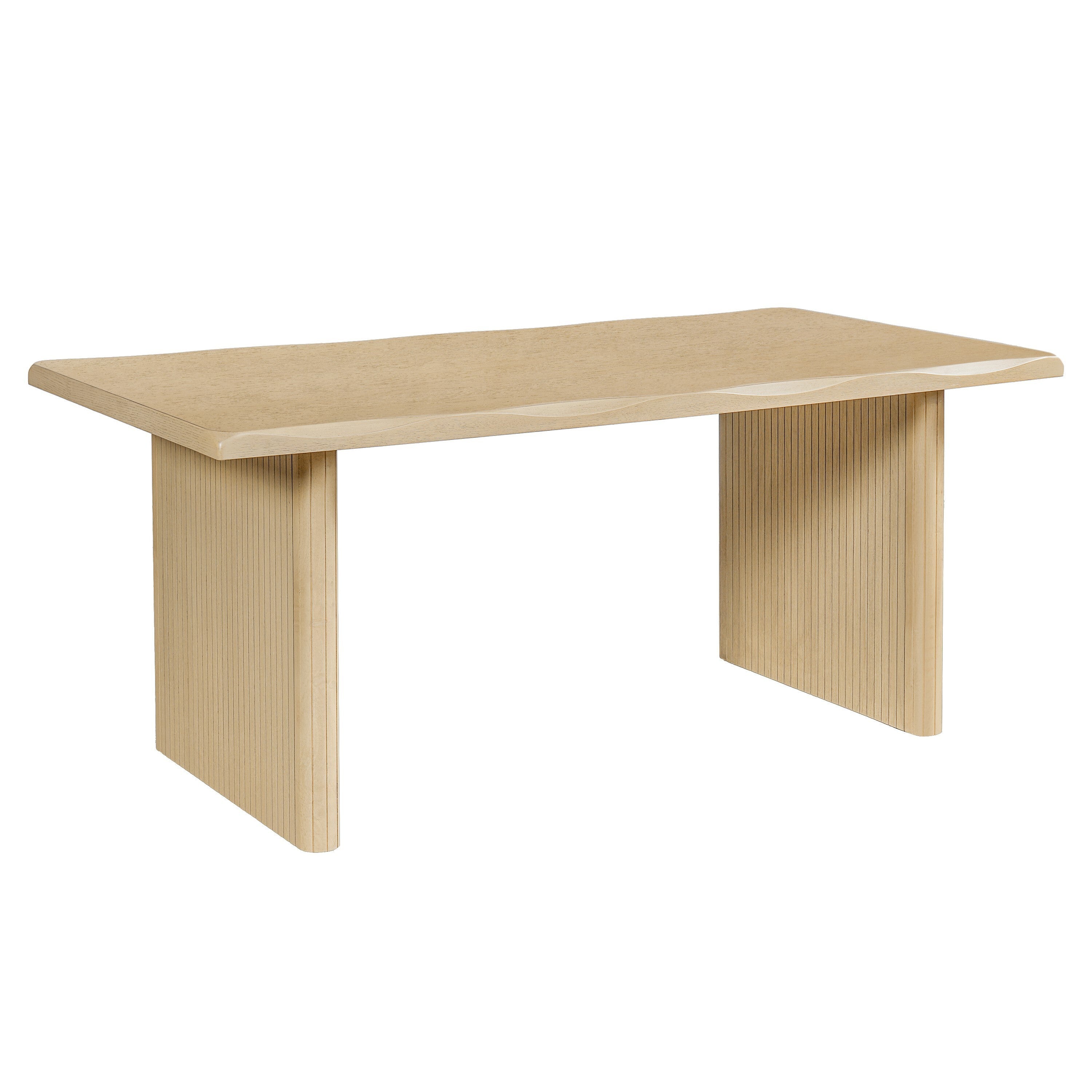 Natural oak dining table styled with fruit bowl and pitcher beside cream chairs