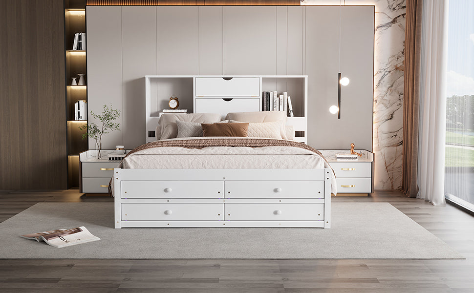 Straight-on styled view of the white queen storage bed with bookcase headboard and closed footboard drawers