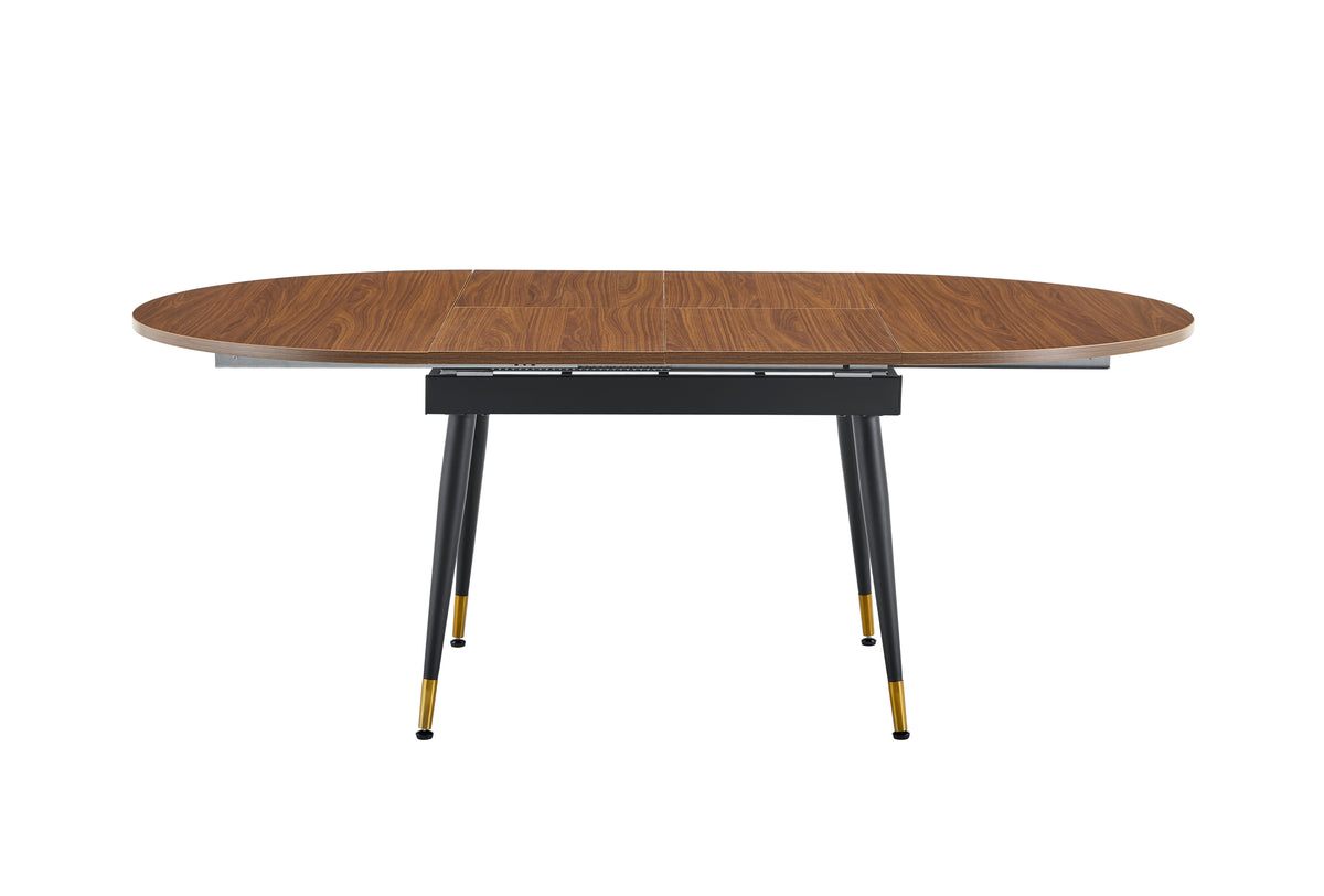 Overhead studio view of the walnut oval extended tabletop showing wood grain