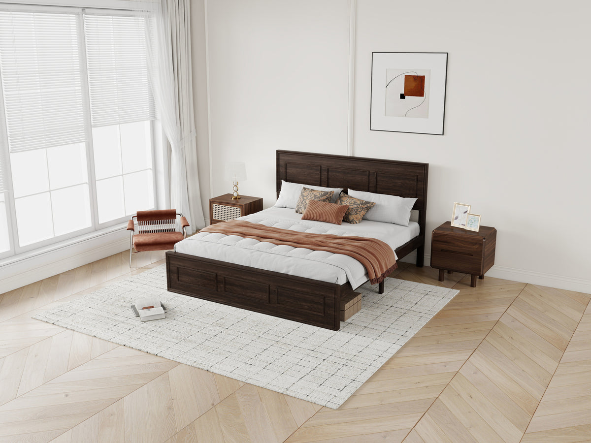 Wide bedroom scene with the rich brown wood queen bed, nightstands and framed art