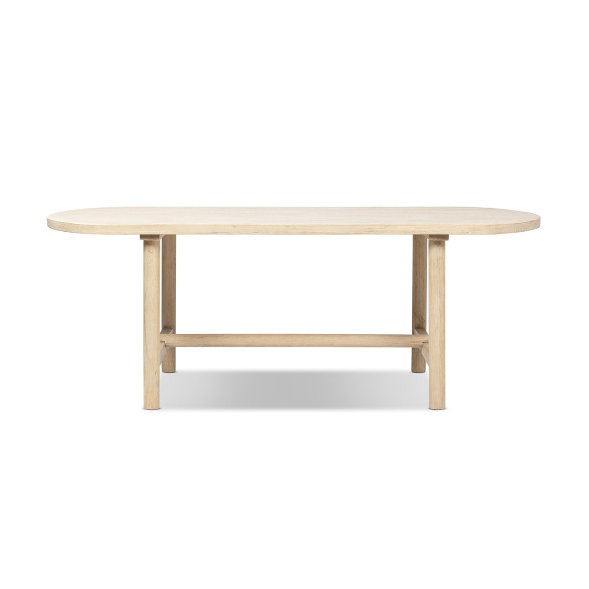 Natural cerused pine oval dining table, front view on white studio background