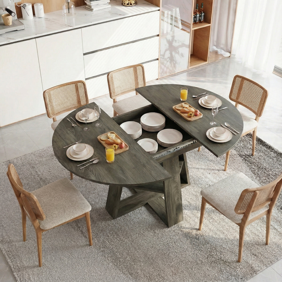 Overhead view of the gray table opened to reveal hidden storage with stacked dishes