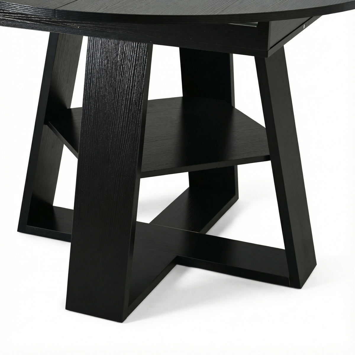 Close-up of the black cross-shaped base and lower storage shelf