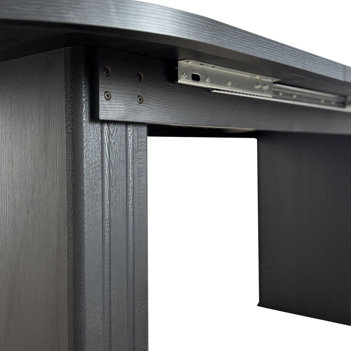 Close-up of the metal telescoping slide rail and mounting screws under the tabletop
