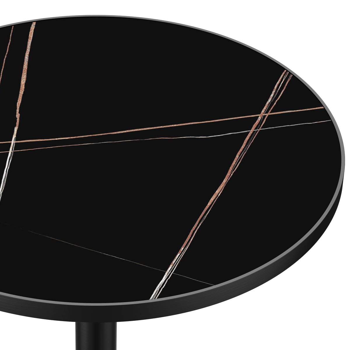 Close-up of black marble-look sintered stone tabletop with copper and white veining
