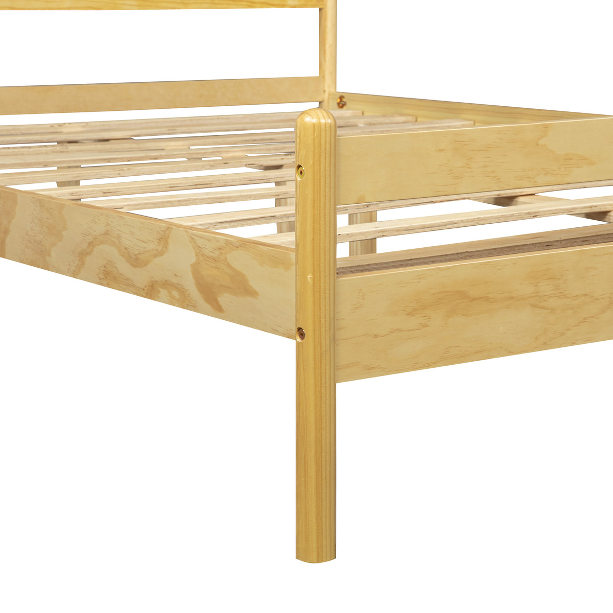 Corner detail of the natural pine footboard post and slat frame