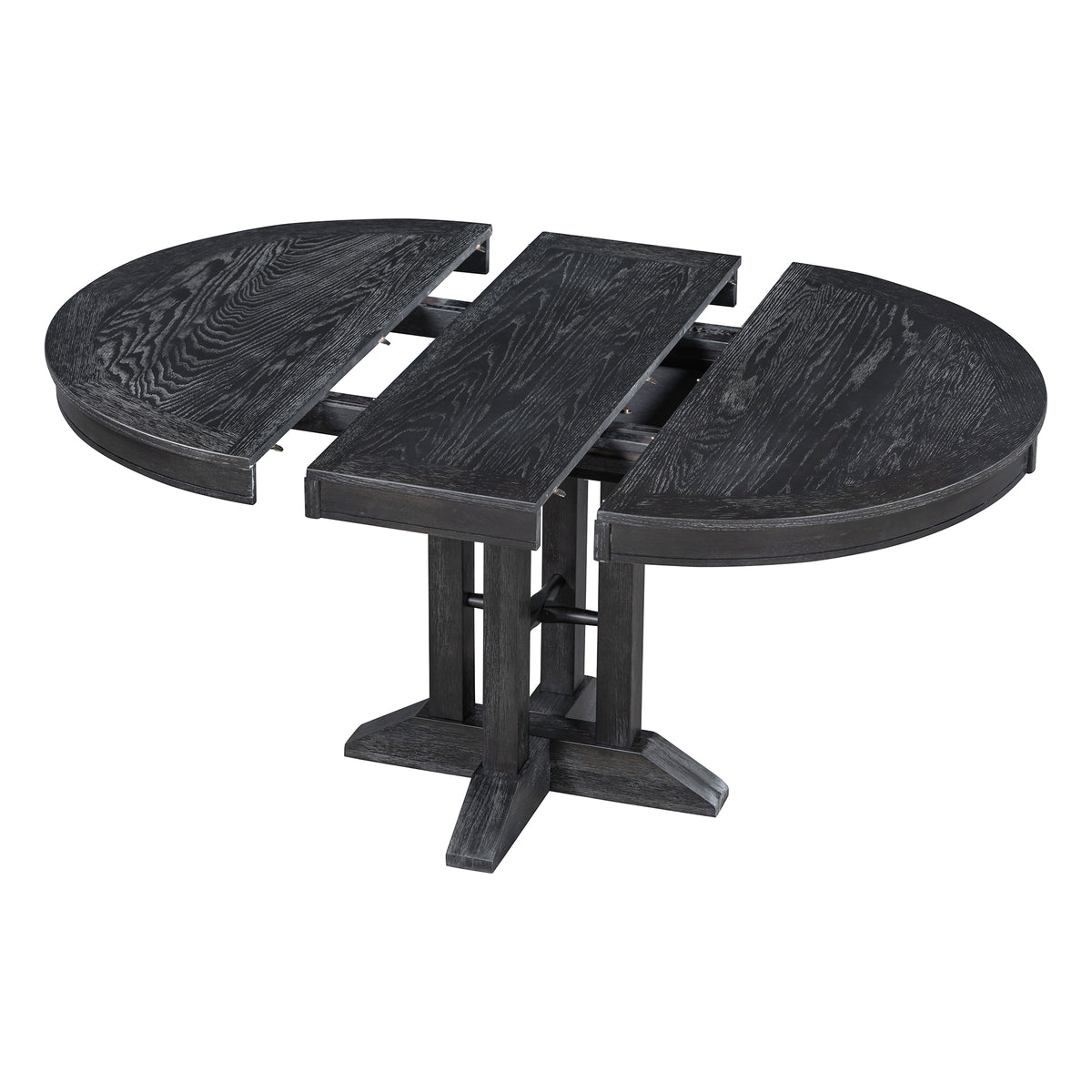 Black oval-extended dining table on white studio background, angled view of the pedestal base