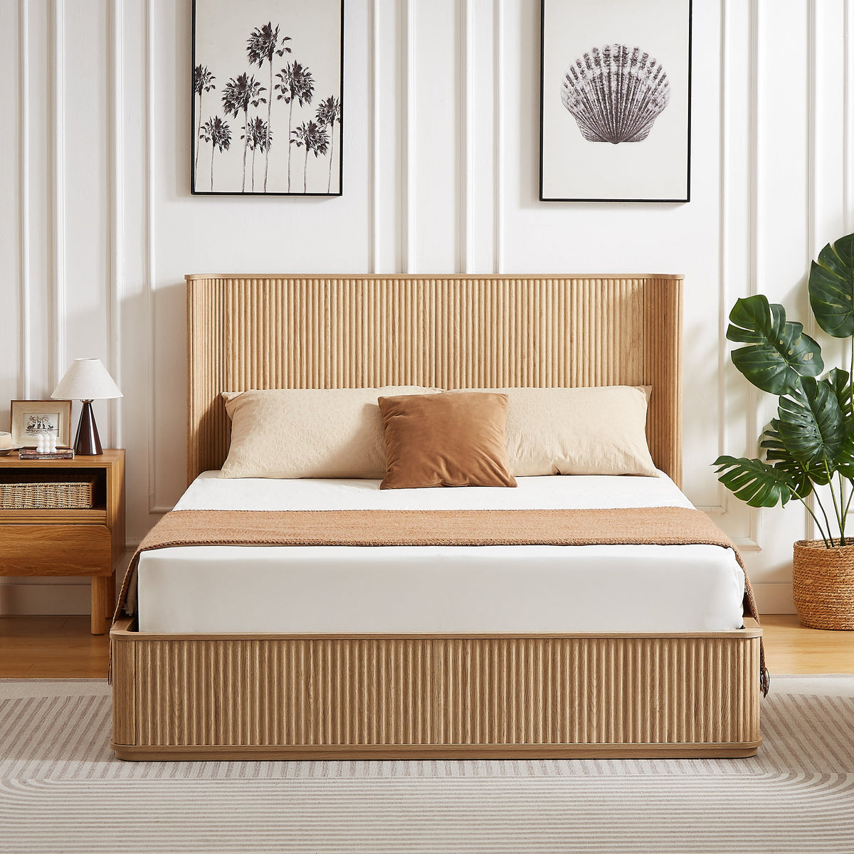 Queen bed frame styled in a bright coastal bedroom