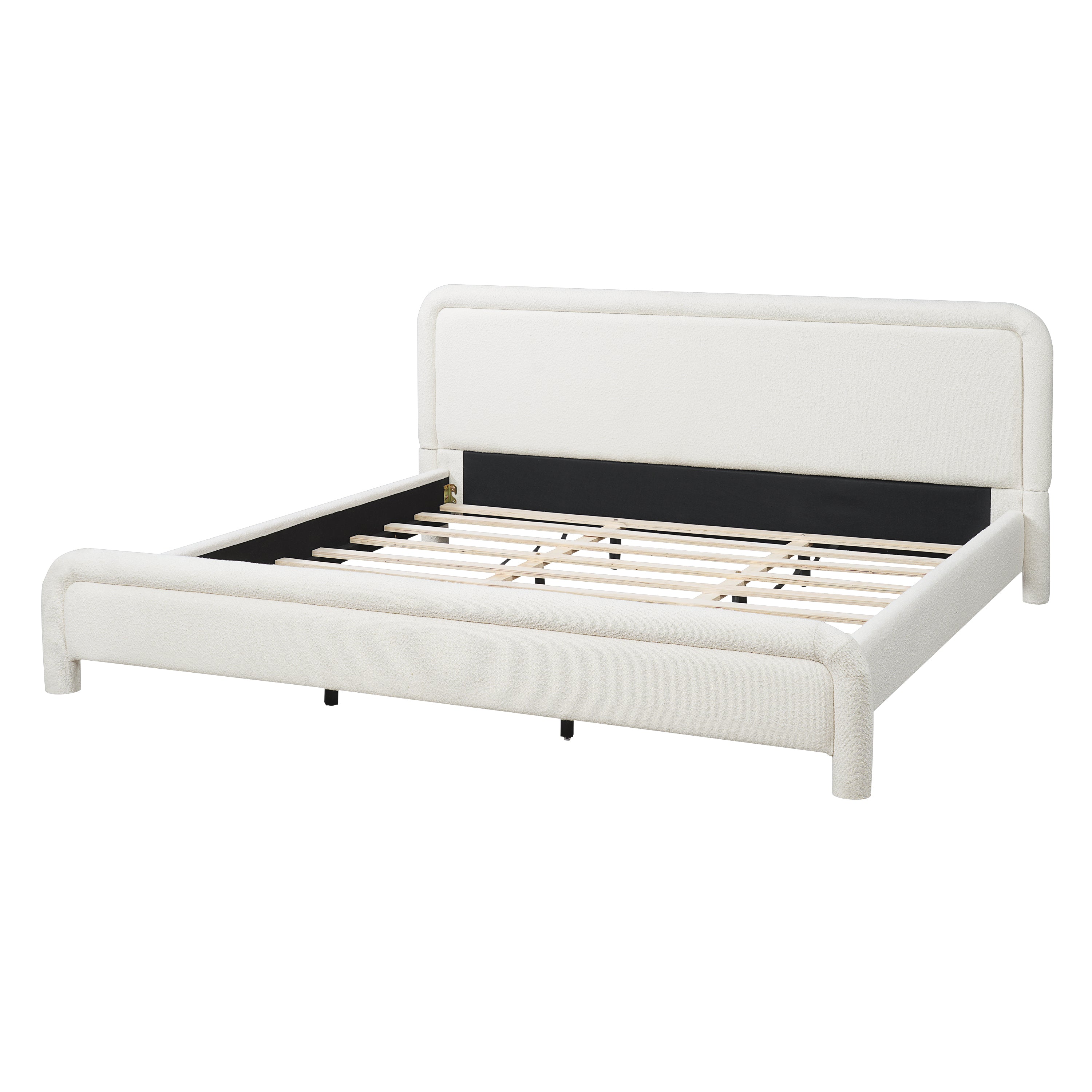 White boucle king bed frame with curved headboard and footboard, angled view