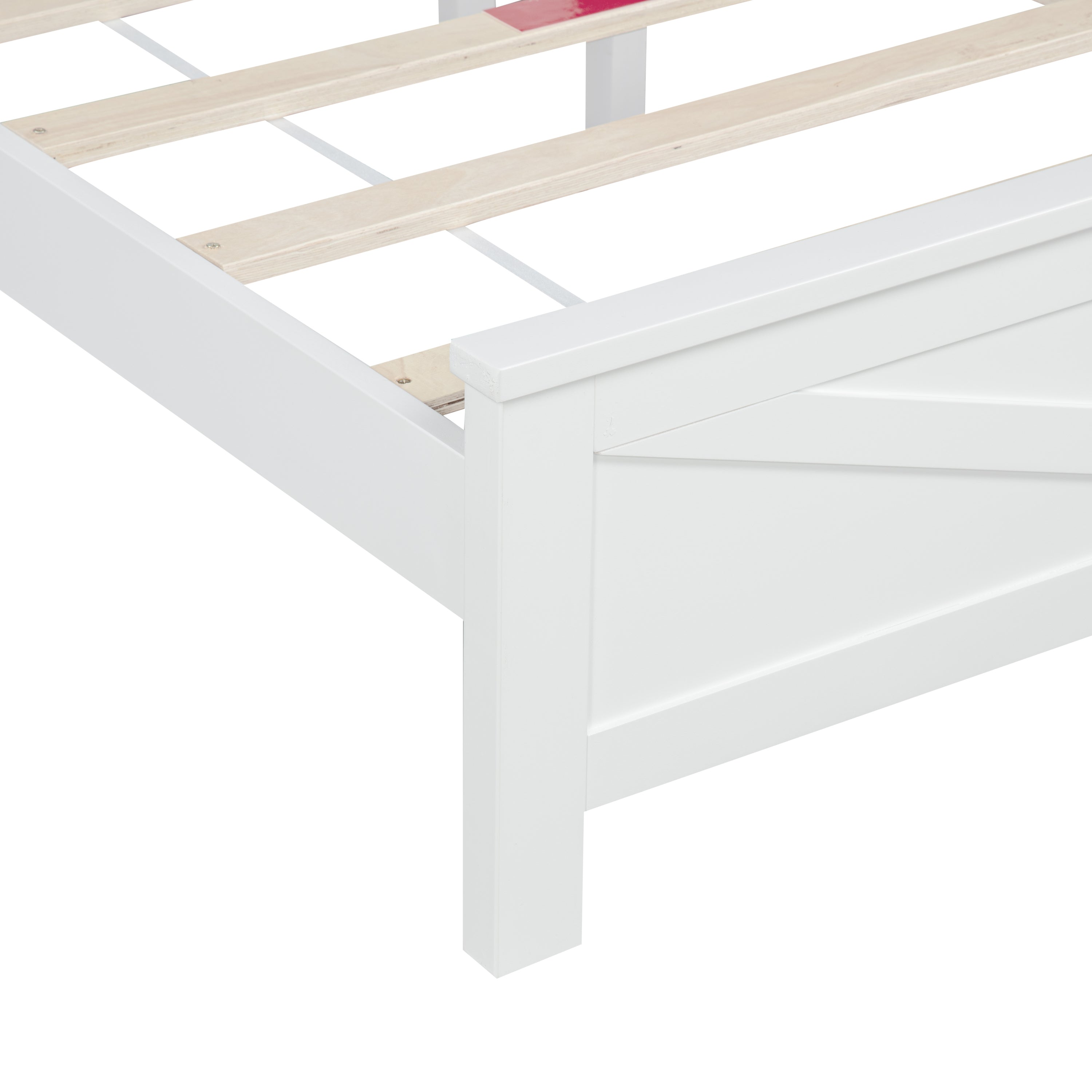 Close-up of the barn door footboard corner and a center support leg under the slats