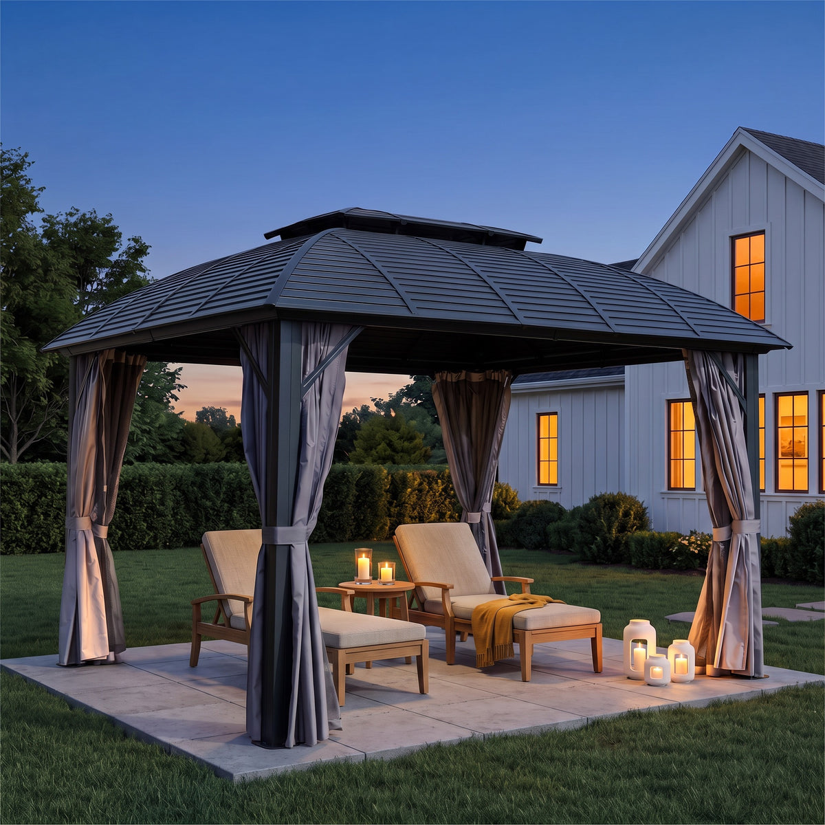 Black aluminum double roof hardtop gazebo with gray curtains over two loungers on a stone patio at dusk
