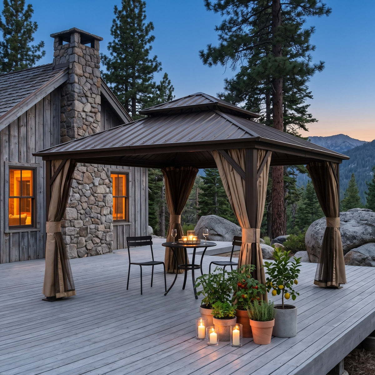 Brown aluminum 12x12 double roof gazebo with tan curtains over a bistro table on a cabin deck at dusk