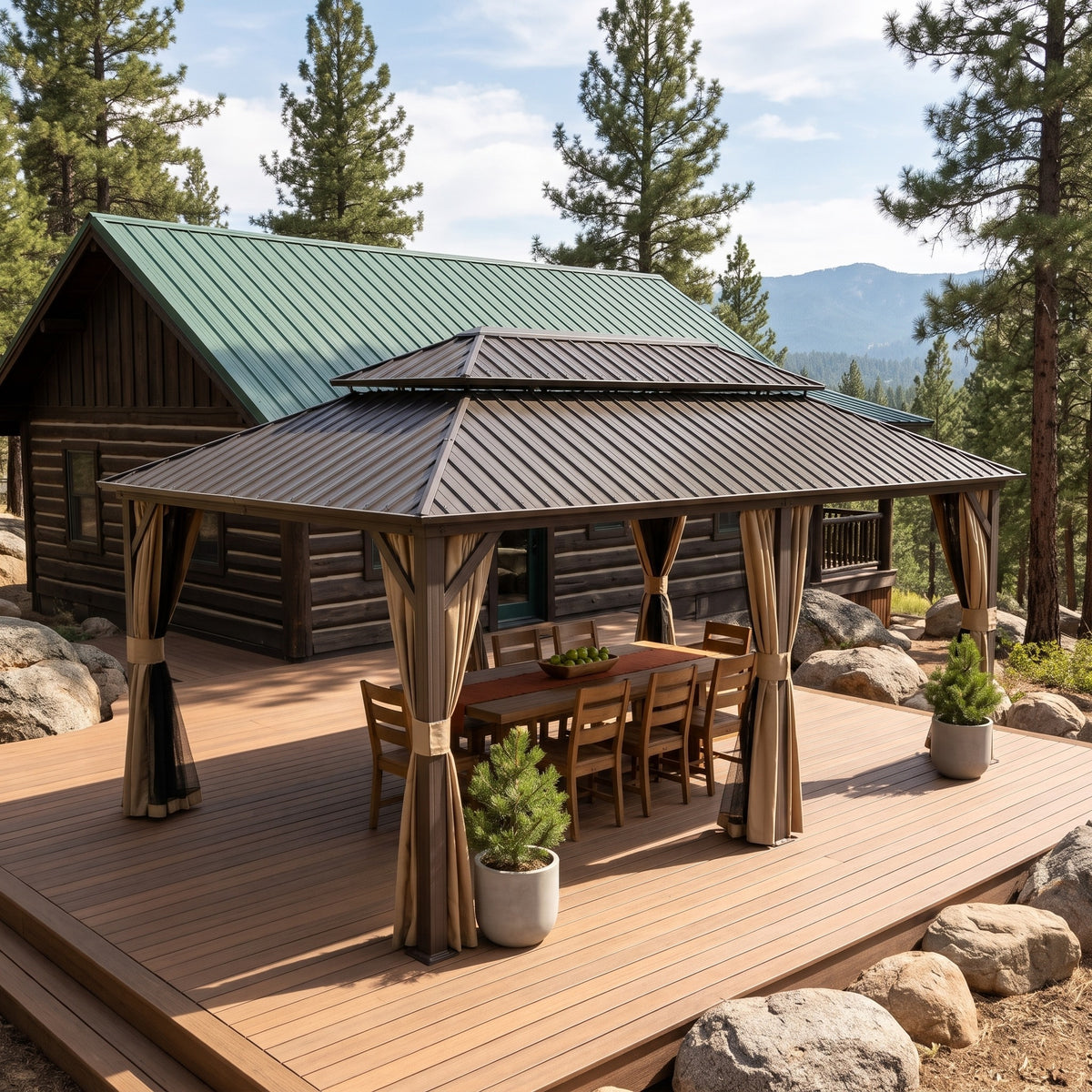 Brown aluminum 12x18 double roof hardtop gazebo with tan curtains over a dining table on a cabin deck in the pines