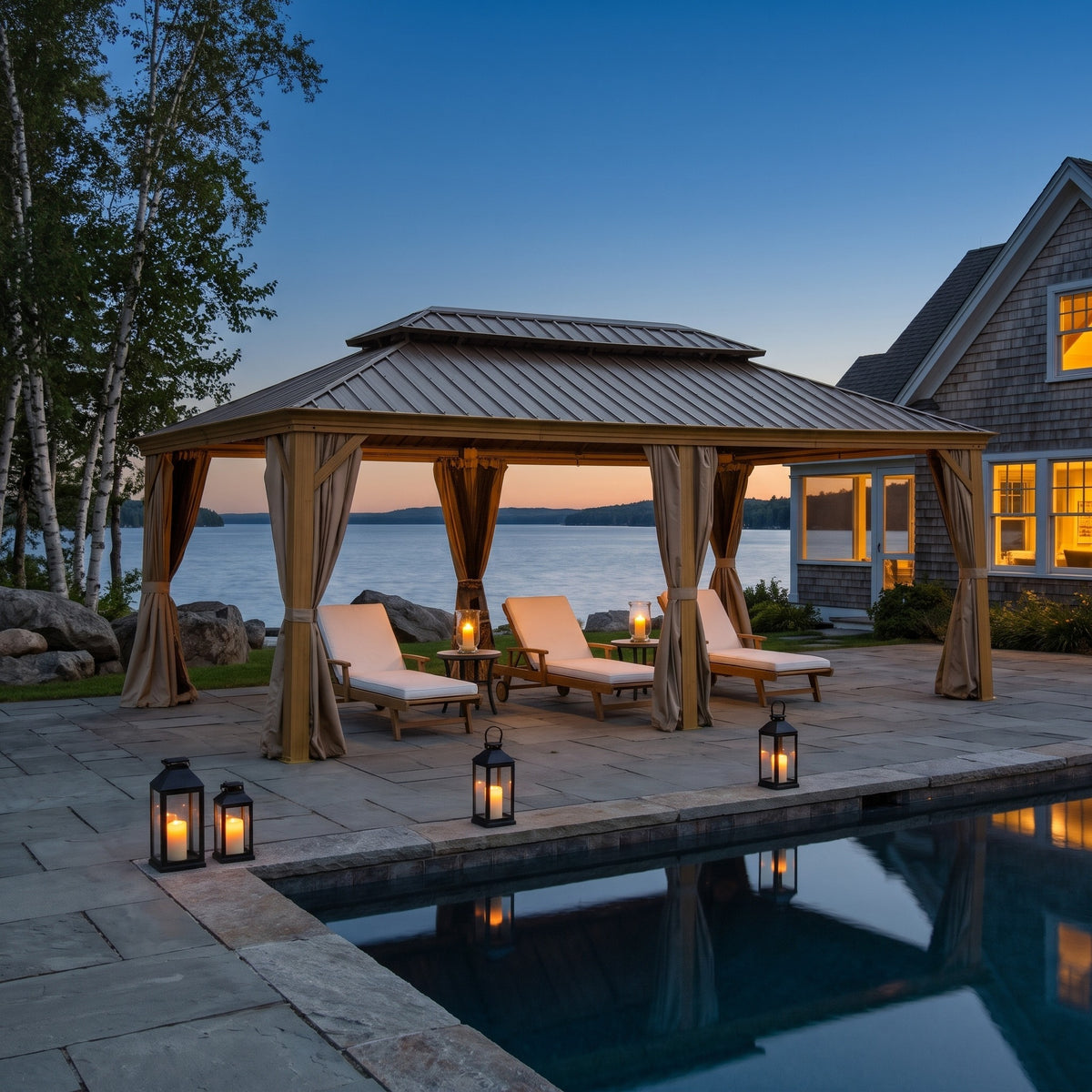 Yellow brown aluminum 12x18 double roof hardtop gazebo over three loungers by a lakeside pool at dusk