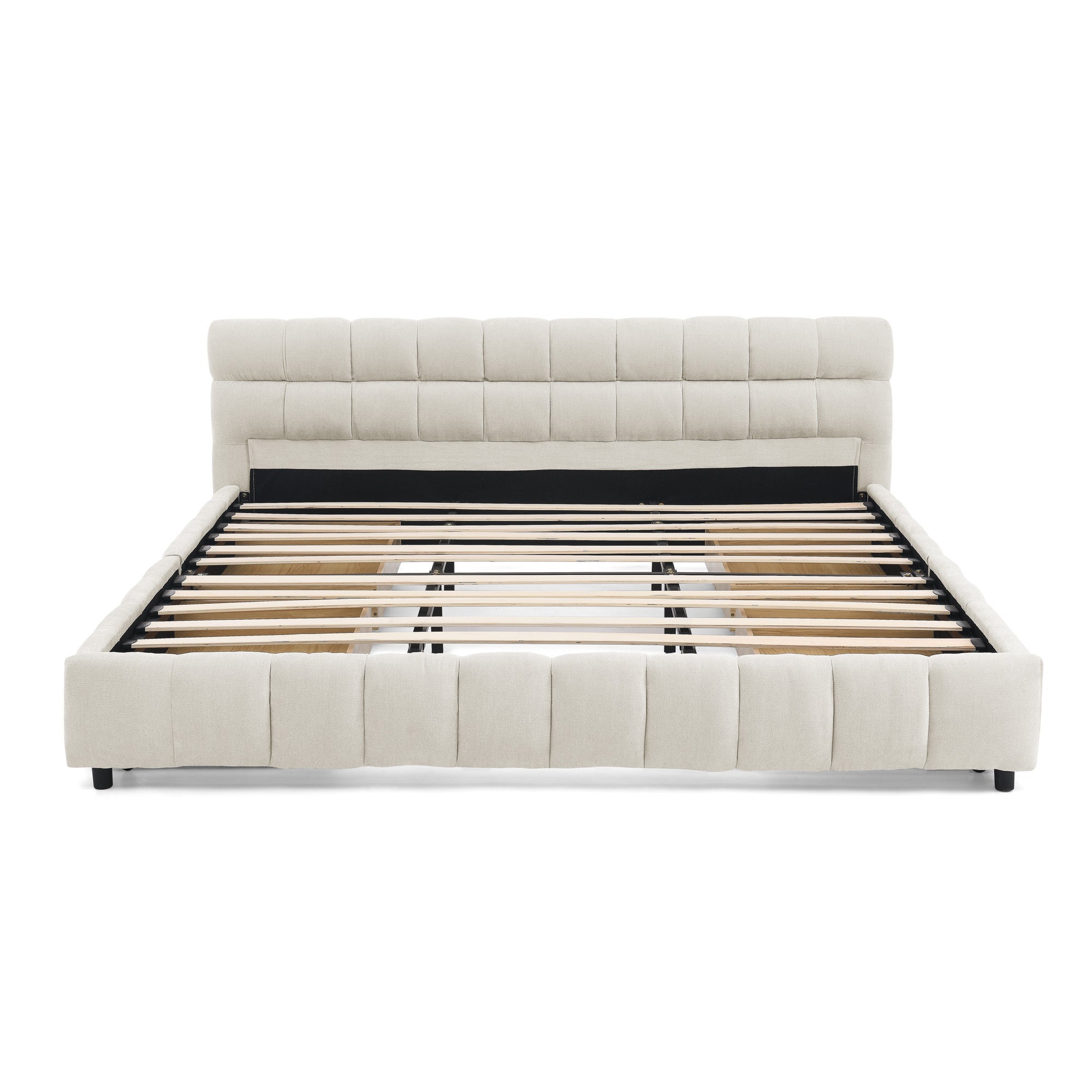 Close-up of beige tufted chenille footboard corner and leg
