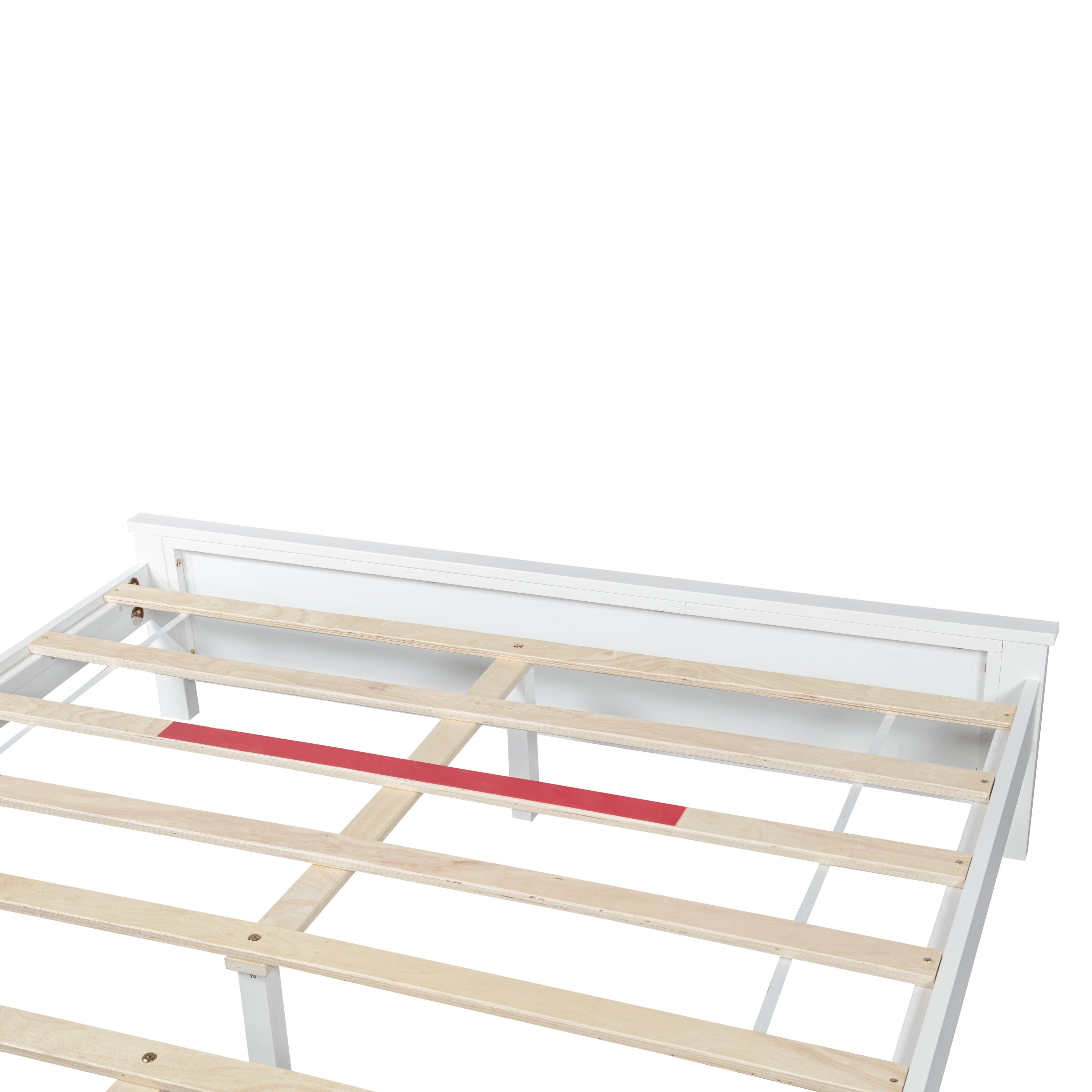 Close-up of the white headboard top rail meeting the exposed wood slat platform