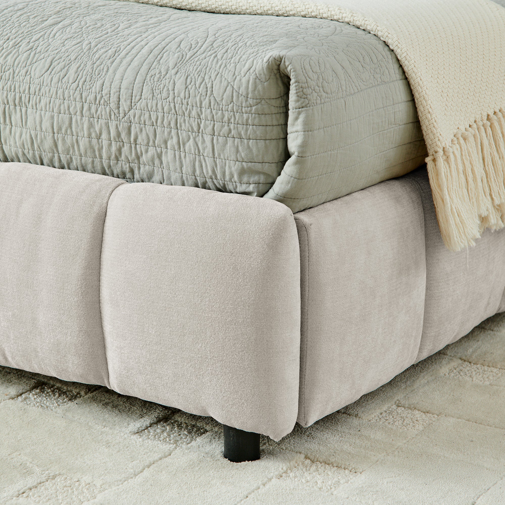 Beige chenille bed frame with both underbed drawers open, angled view