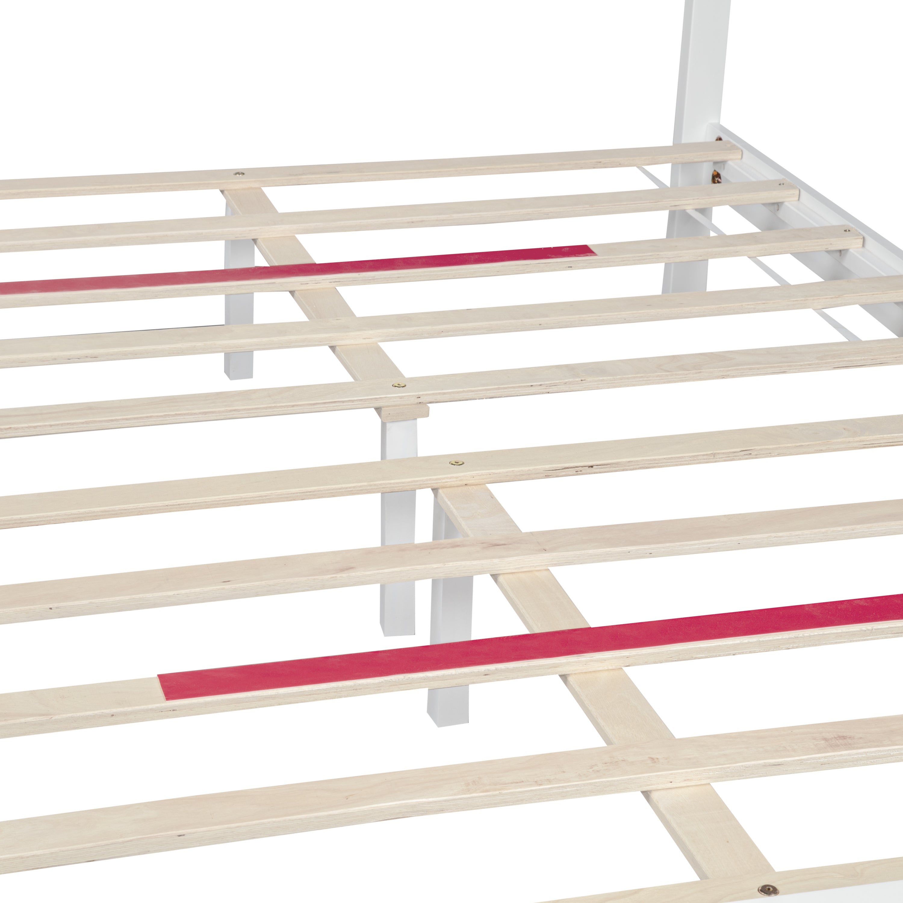 Close-up of the white bed slats with anti-slip strips resting on the central support legs