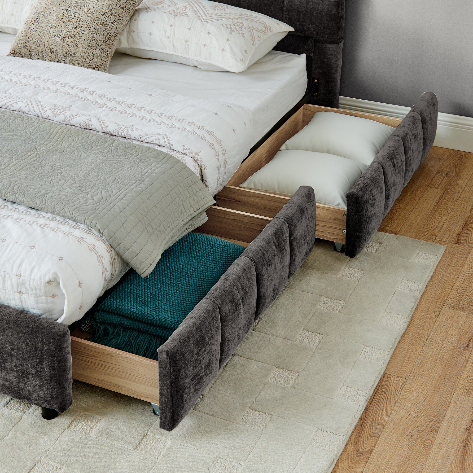 Close-up of tufted footboard corner on California King bed frame
