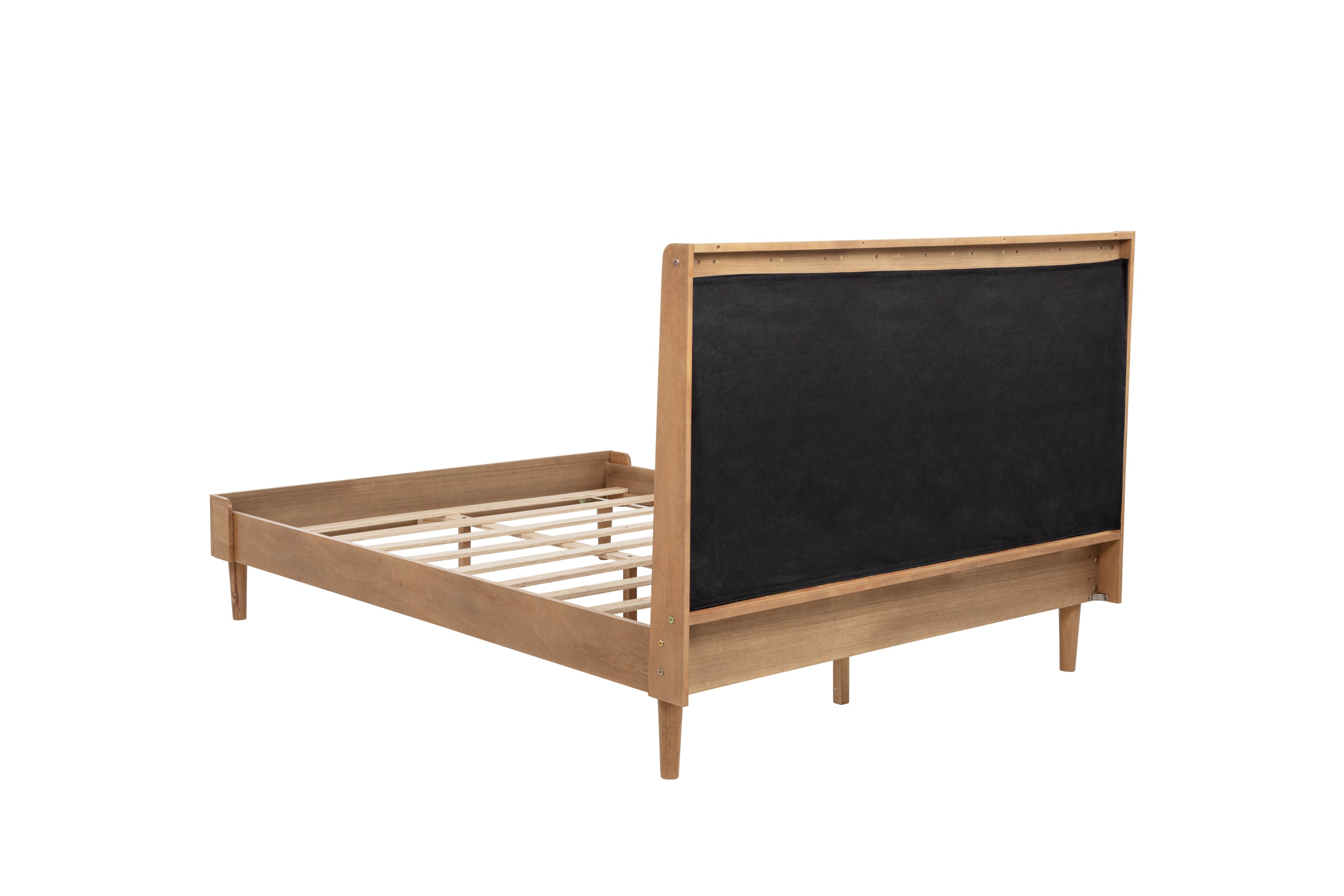 Rear three-quarter view of the headboard with its black protective cloth cover and wood legs
