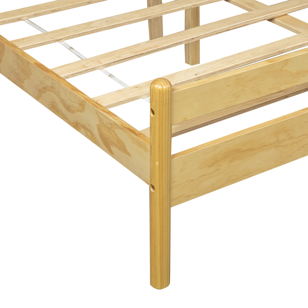Angled detail of the natural pine footboard post, slats and support leg