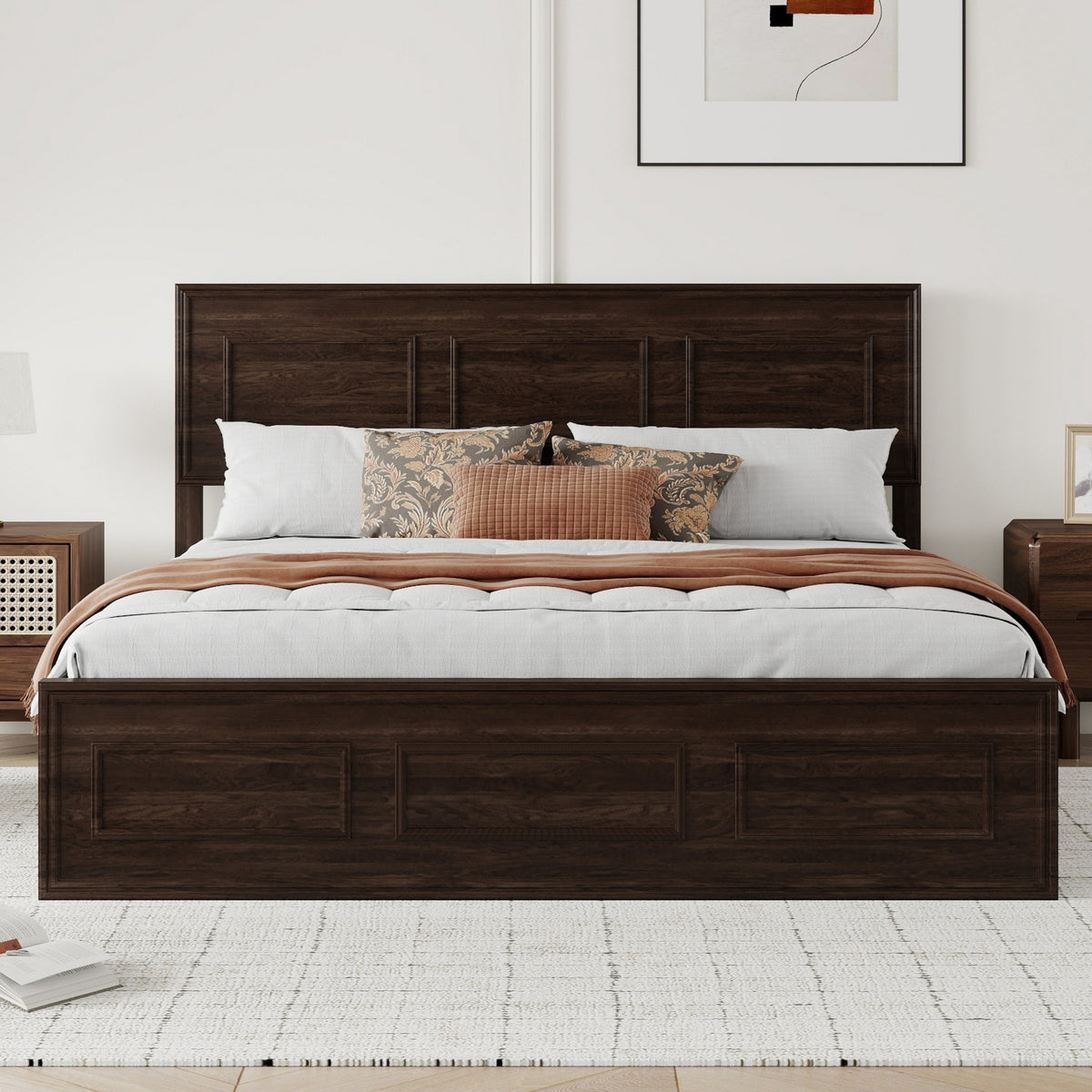 Front view of rich brown wood queen bed with white and rust bedding in a bright bedroom