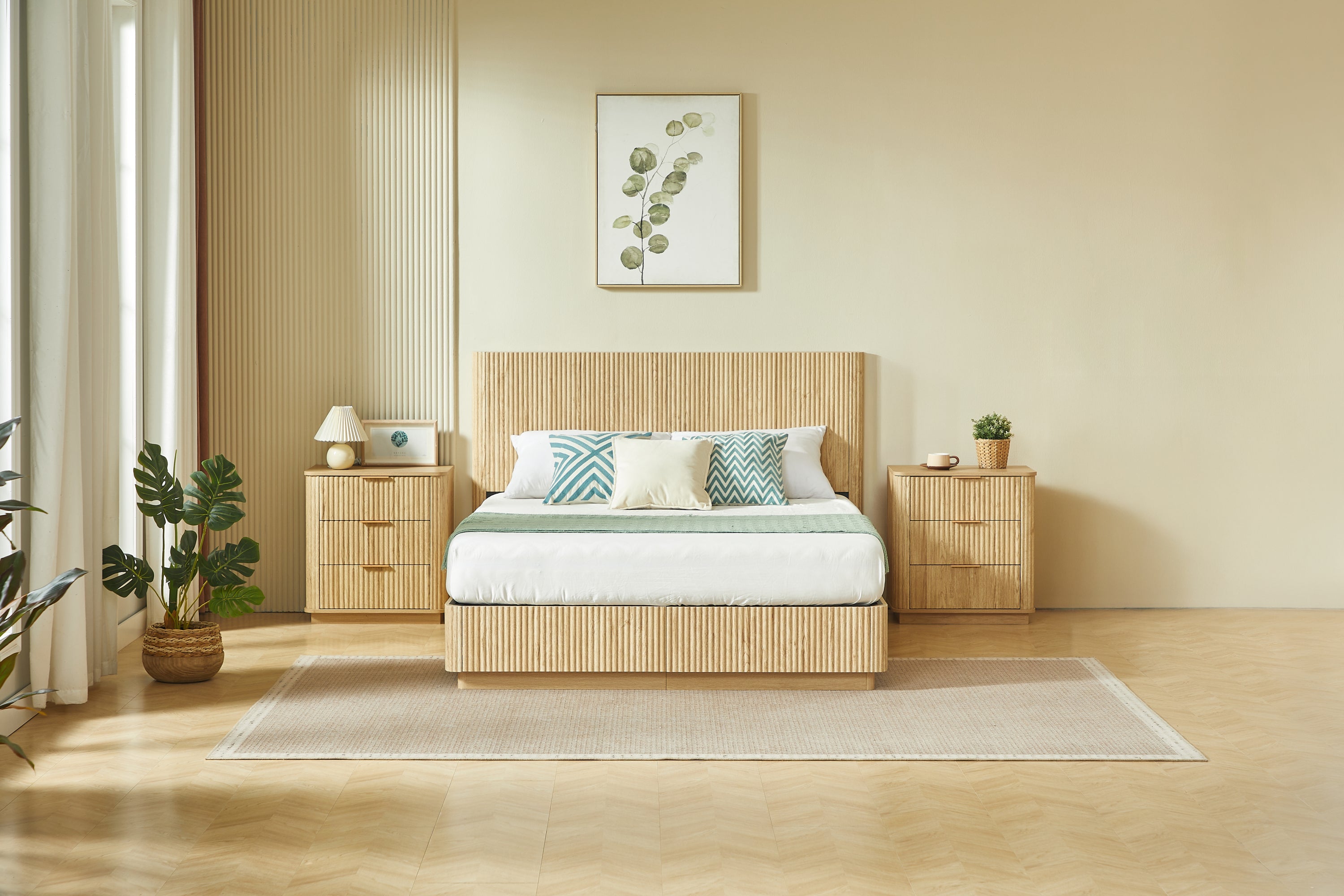 Symmetrical front view of light oak fluted queen bed styled between two matching nightstands #Color_Oak