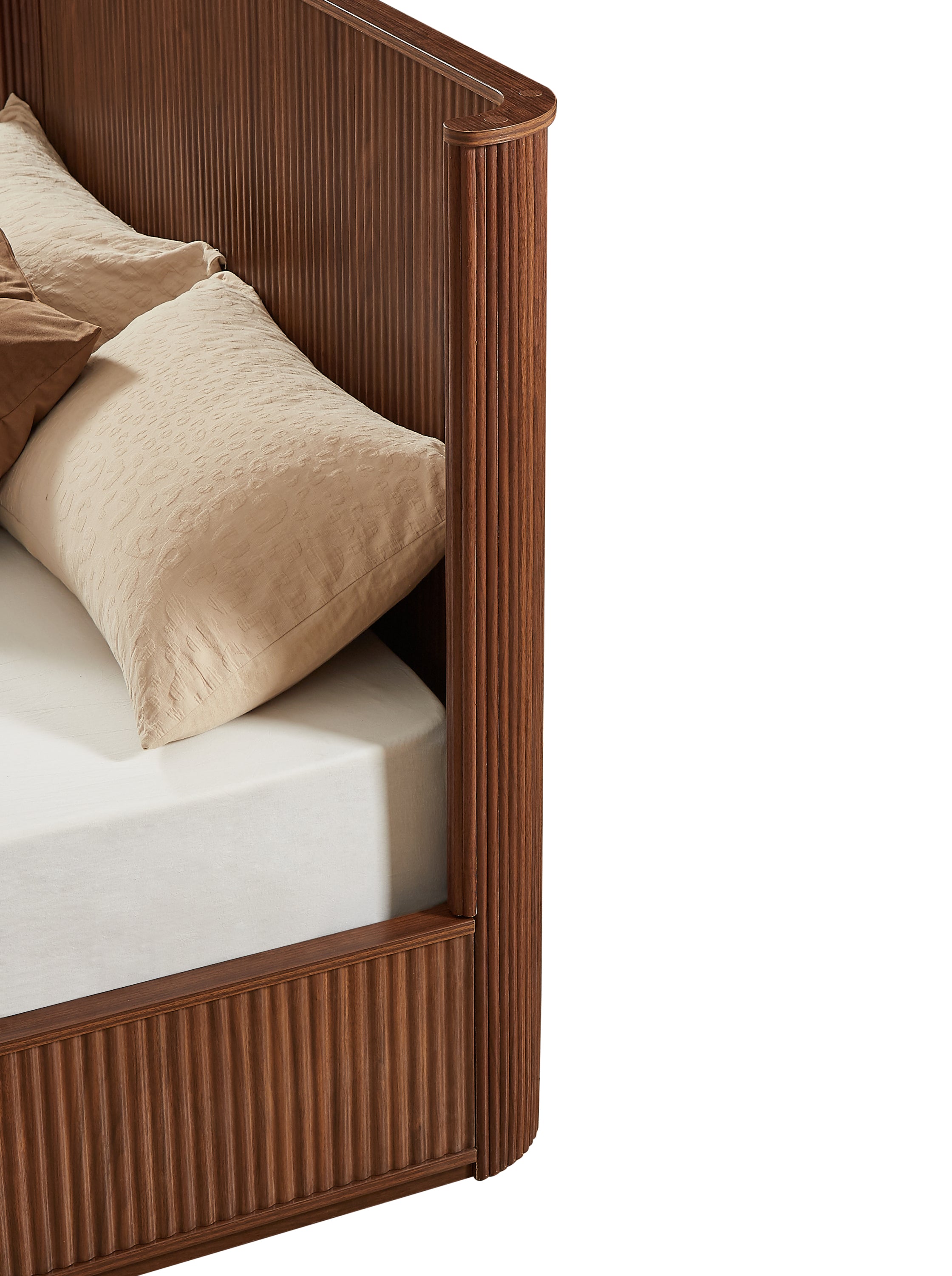 Close-up of the walnut headboard corner post, vertical fluting and semi-enclosed wraparound edge #Color_Walnut
