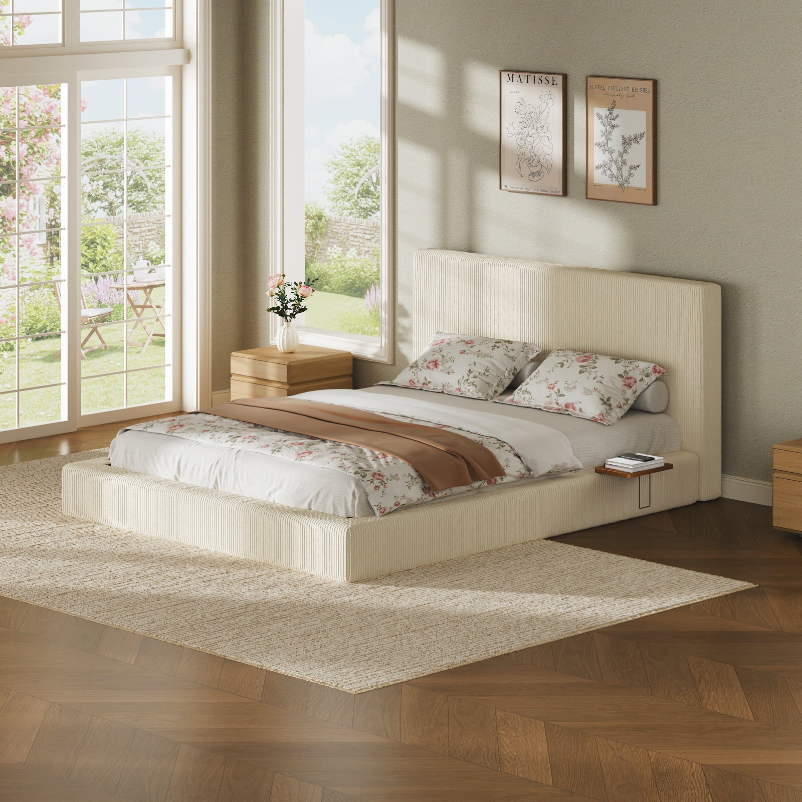Angled cream corduroy queen platform bed with a wooden sliding side shelf holding books