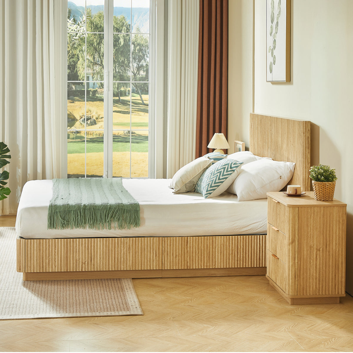 Front view of light oak fluted queen platform bed with tall slatted headboard between two dressers