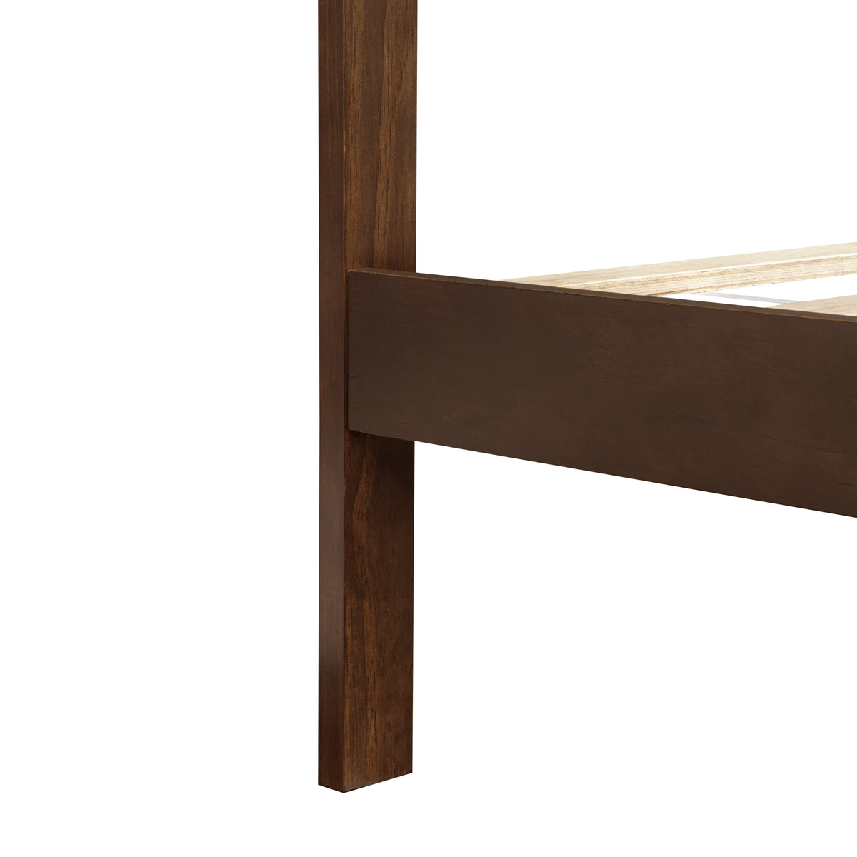 Closeup of rich brown bed frame leg and side rail
