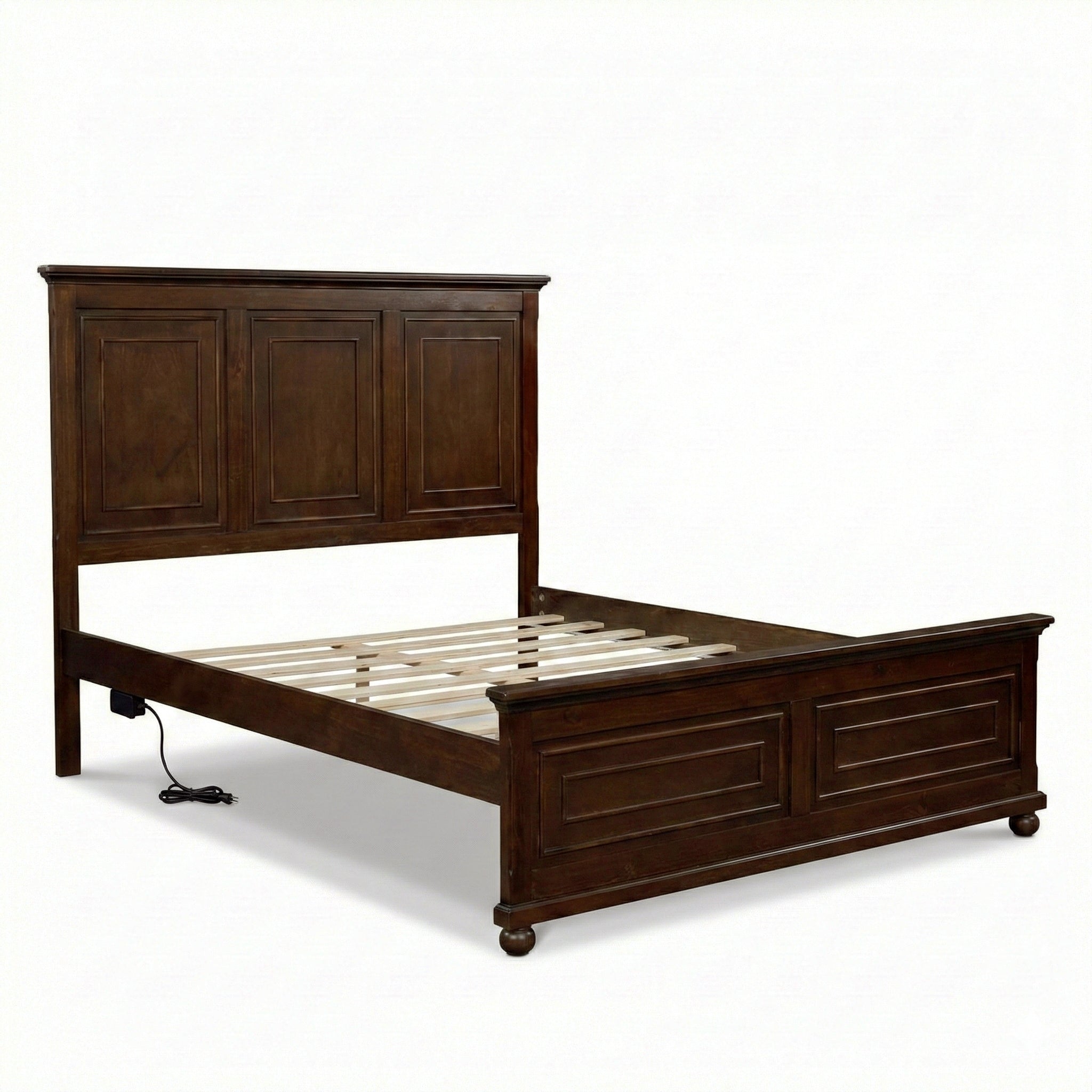 Angled bare frame showing the side-rail charging station and power cord on the rich brown queen bed