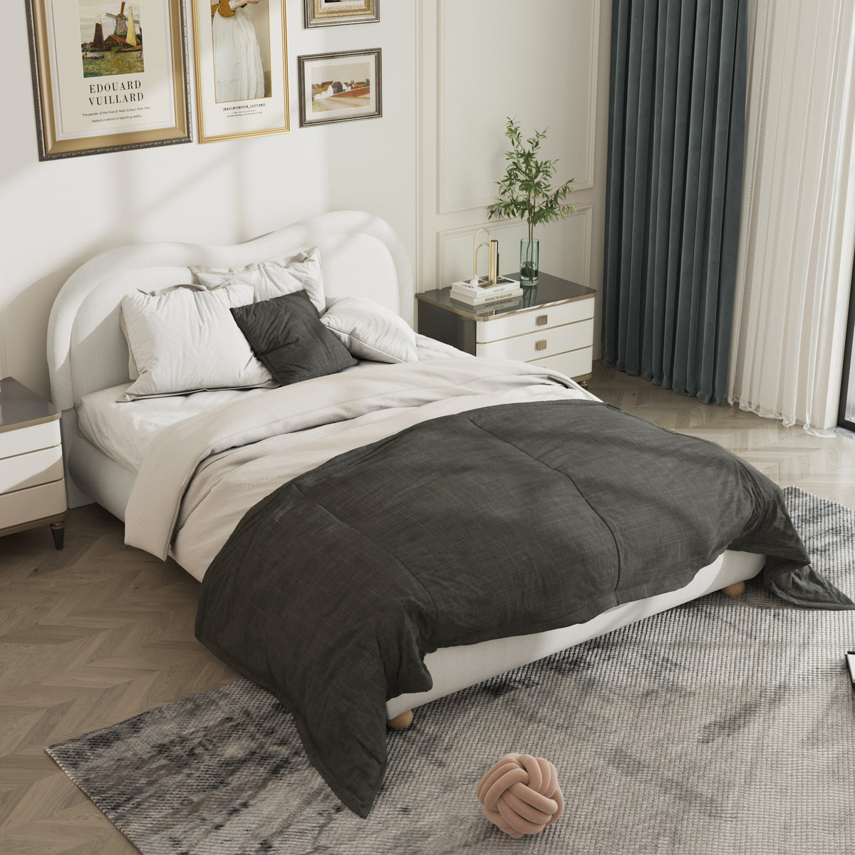 Overhead angle of beige chenille platform bed with dark bedding in a styled bedroom