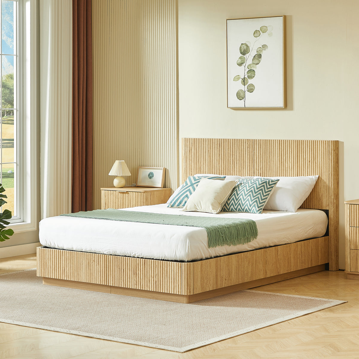 Angled view of light oak fluted queen platform bed styled in a bright bedroom with nightstand